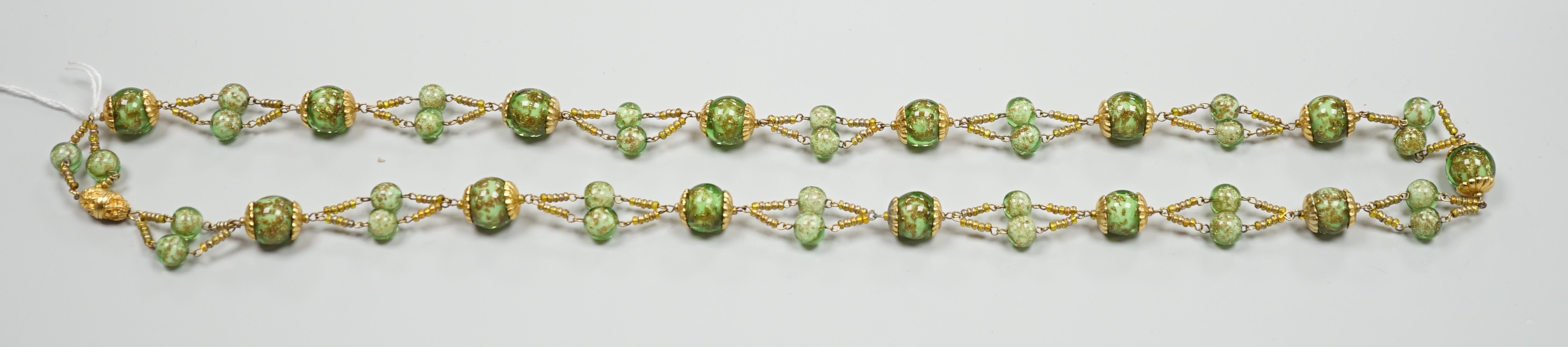 A late 20th century gilt metal and Murano glass bead set necklace, 74cm.